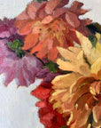 Framed, vintage, still life oil painting of a bouquet of red flowers.