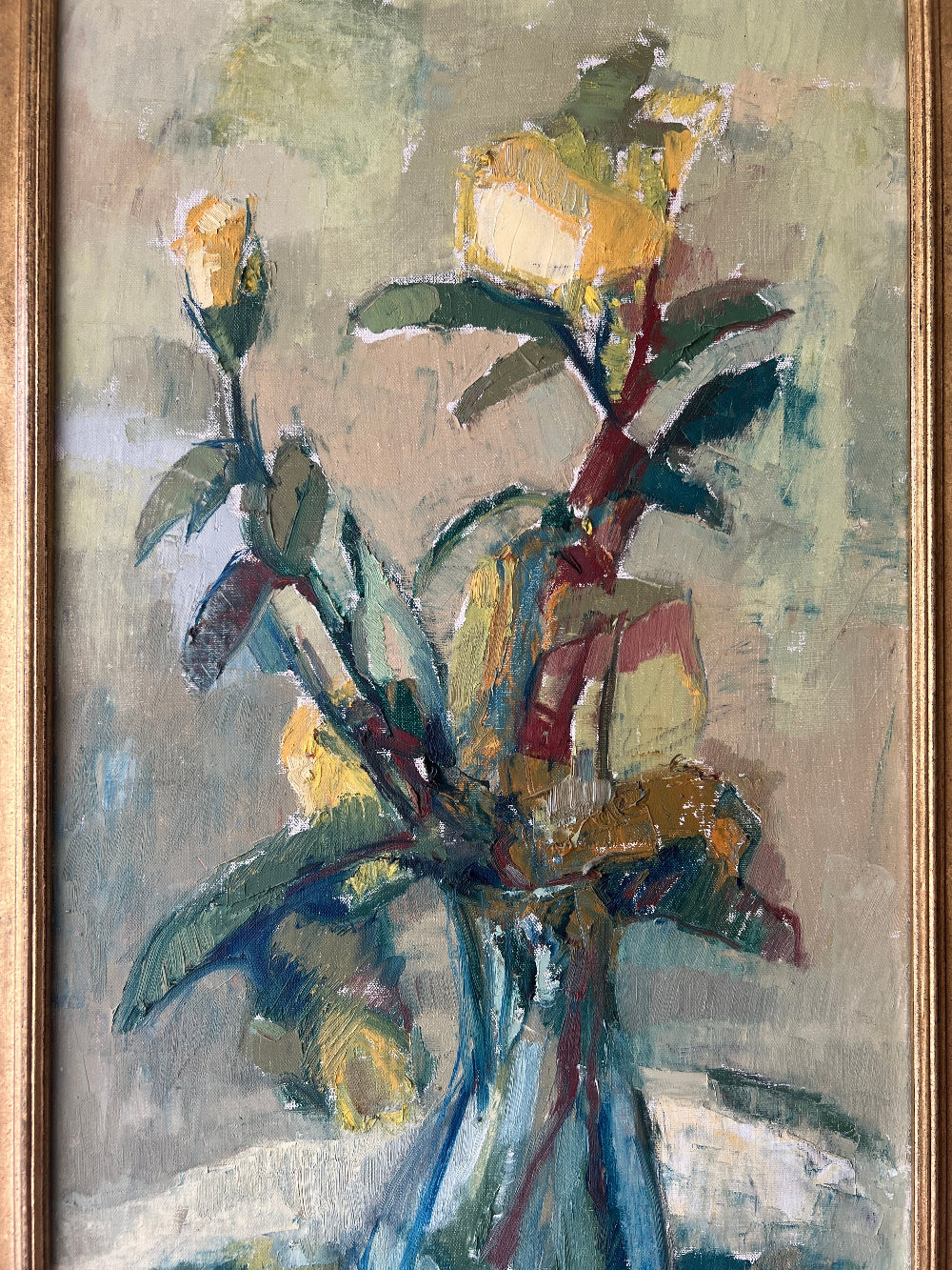 A close up of a vintage still life floral oil painting of yellow roses.