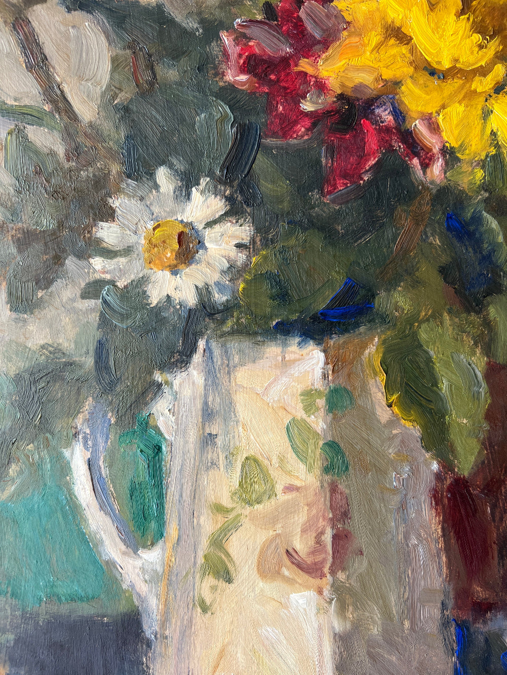 Close up of a framed impressionist oil painting on board of a bouquet of flowers with fruit. Still life art.