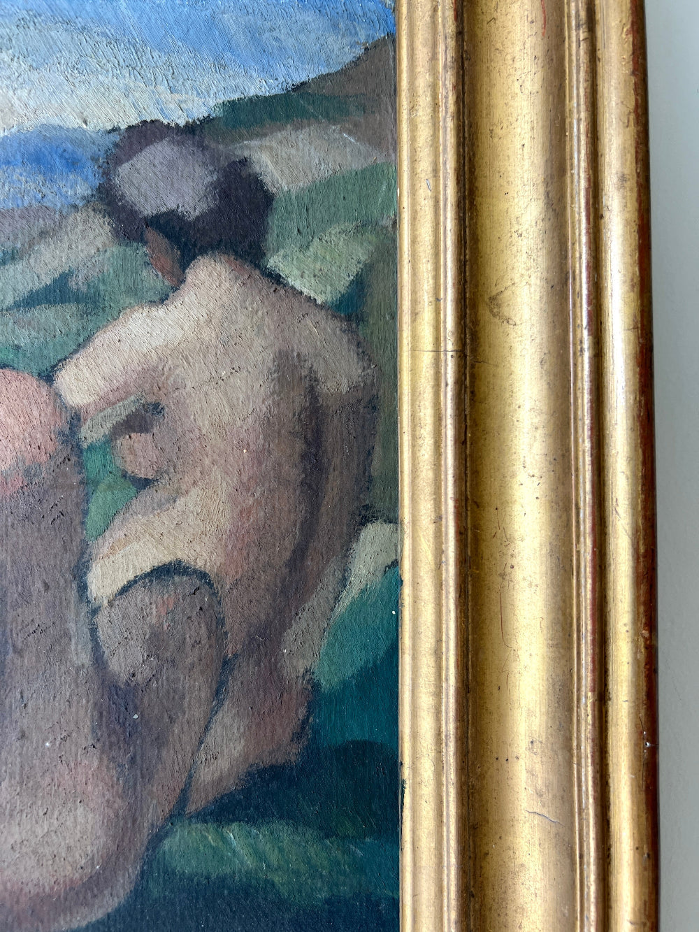 Framed vintage oil painting of a scene with people and nature 