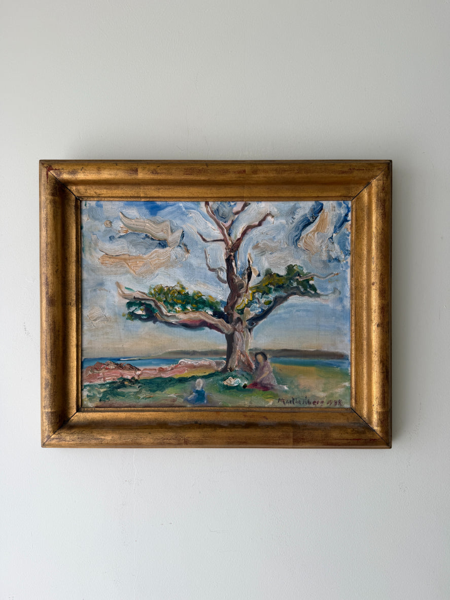Framed vintage oil painting of a landscape with an old tree. Available at Hue. 