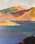 Close up of a framed, vintage oil painting on canvas of a mountainous coastal landscape with houses. Impressionist style.