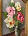 Framed, vintage artwork of roses in a glass vase. Impressionist oil painting.