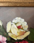 Framed, vintage artwork of roses in a glass vase. Impressionist oil painting.