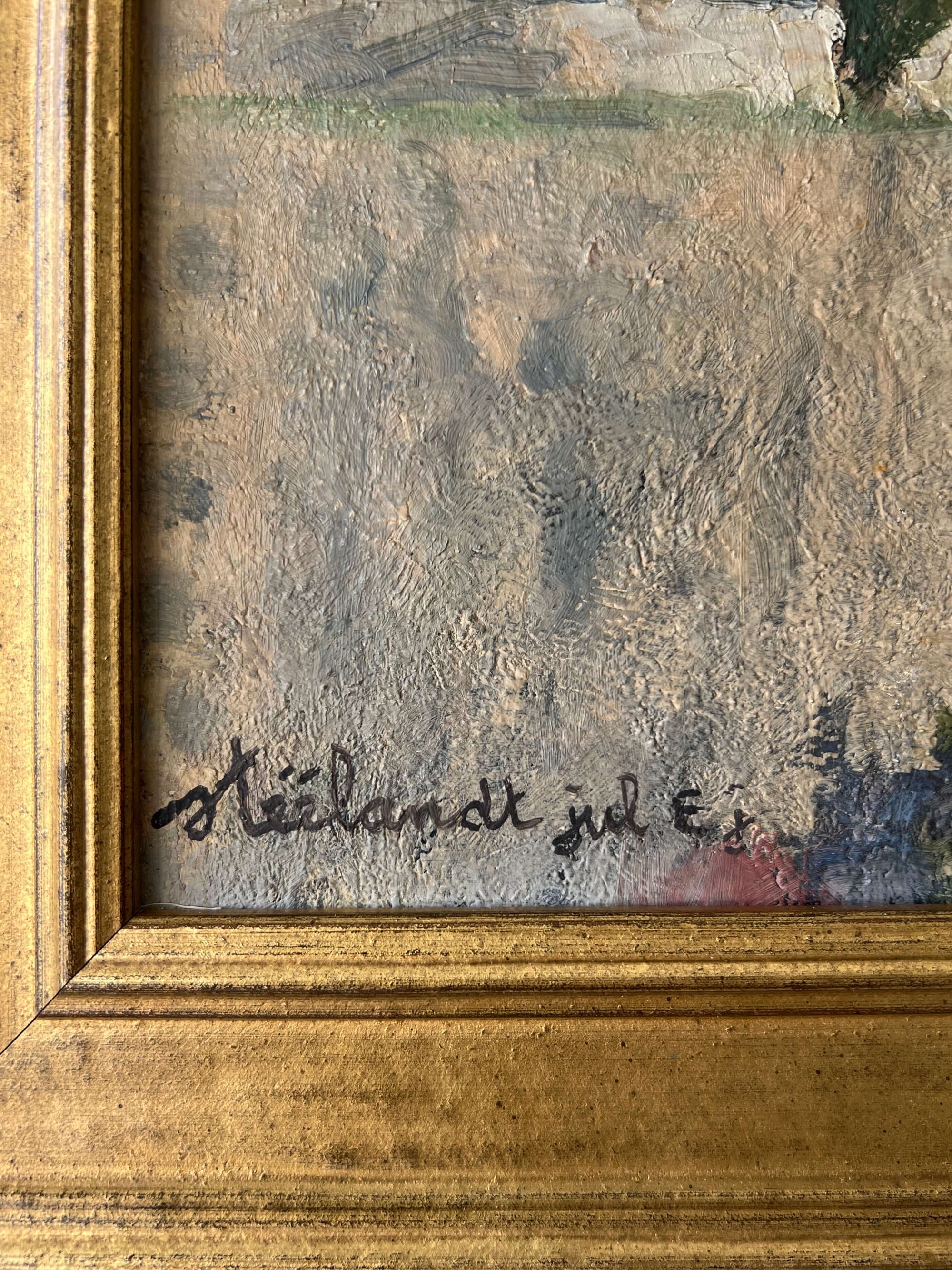 Artist's signature bottom left of oil painting.