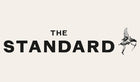 The logo for 'The Standard' featuring bold black text and a small black line-art illustration of a winged figure on a plain white background.