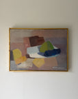 An abstract vintage  still life oil painting in a gold frame. The painting features geometric shapes in brown, beige, yellow, green, blue, and white. Available at Hue. 