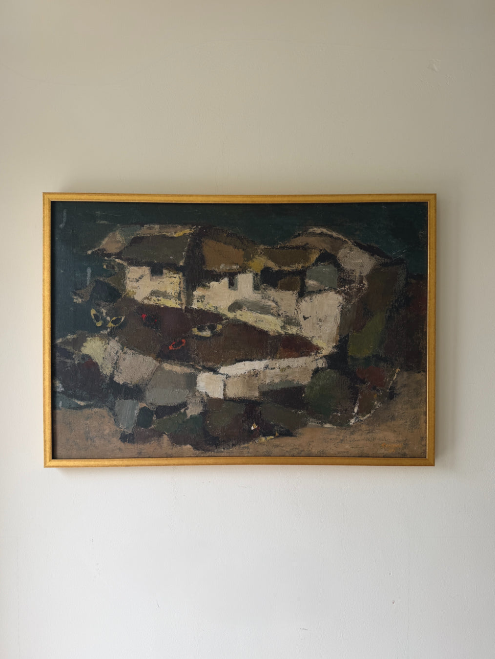 An abstract vintage landscape oil painting of fisherman's huts in a gold frame. Available at Hue.