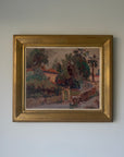 A framed vintage landscape painting depicting a tropical scene with palm trees, a stone wall, country villa, and a pathway, housed in a textured gold frame.  Available at Hue. 