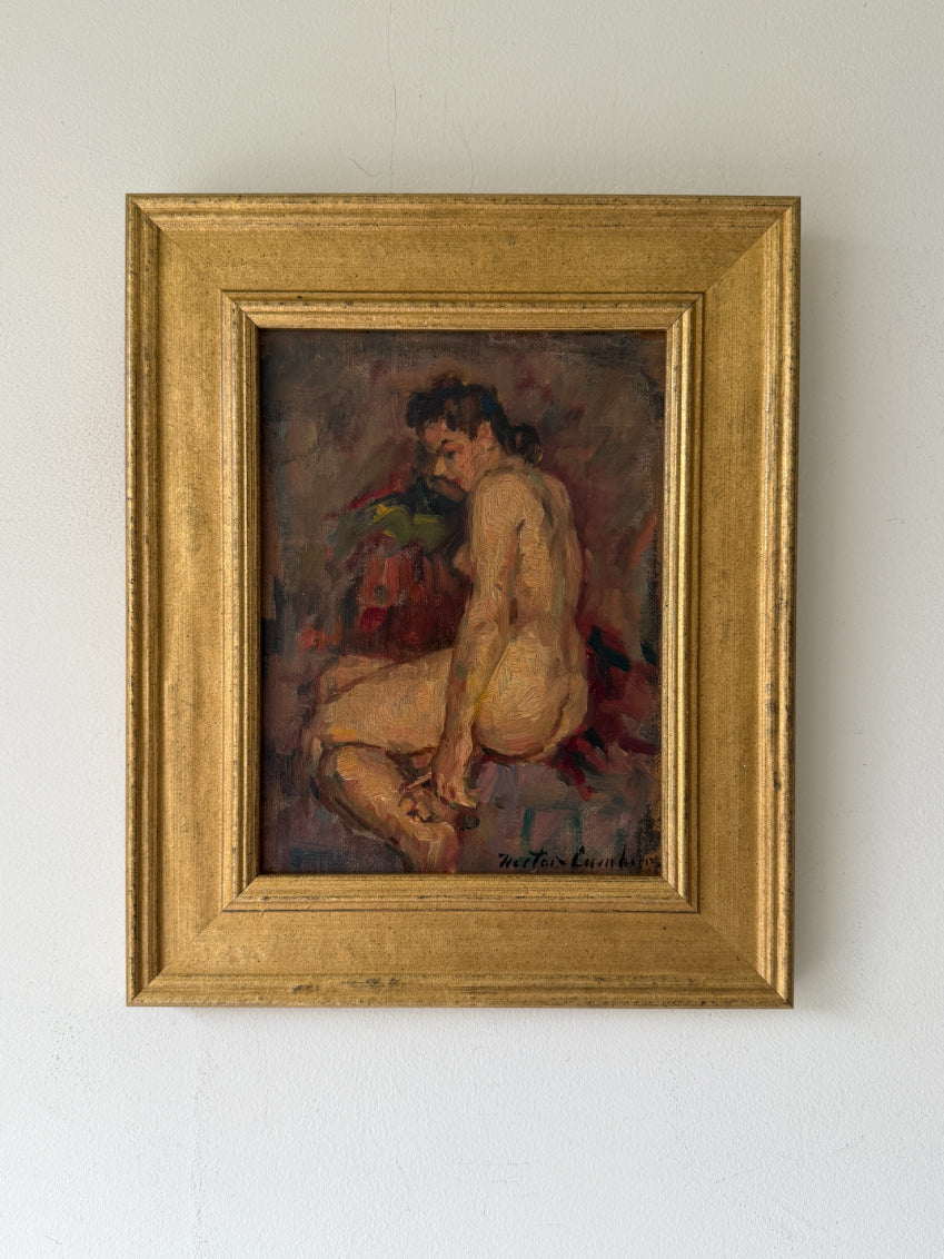 A framed vintage painting of a seated nude figure, housed in a wide ornate gold frame. Available at Hue. 