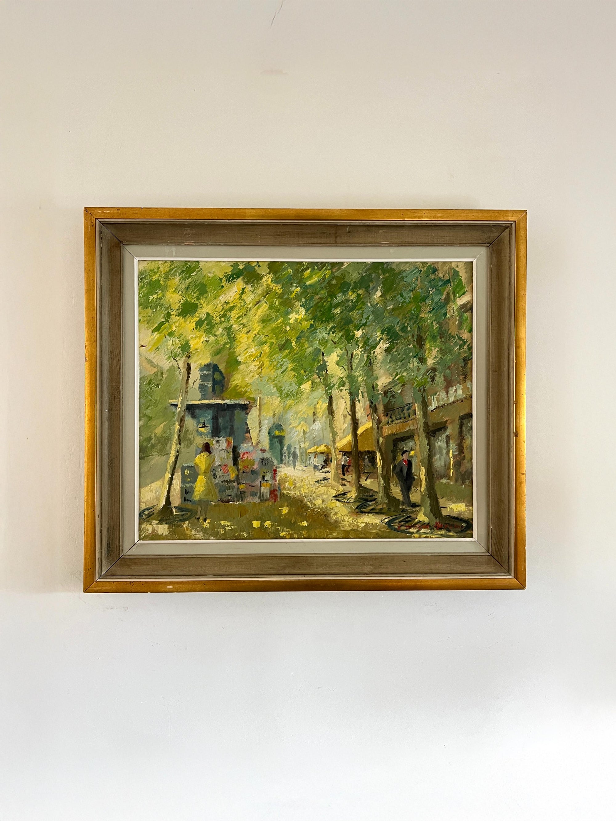 Framed painting of a street scene with trees and people in a vintage frame, available at Hue