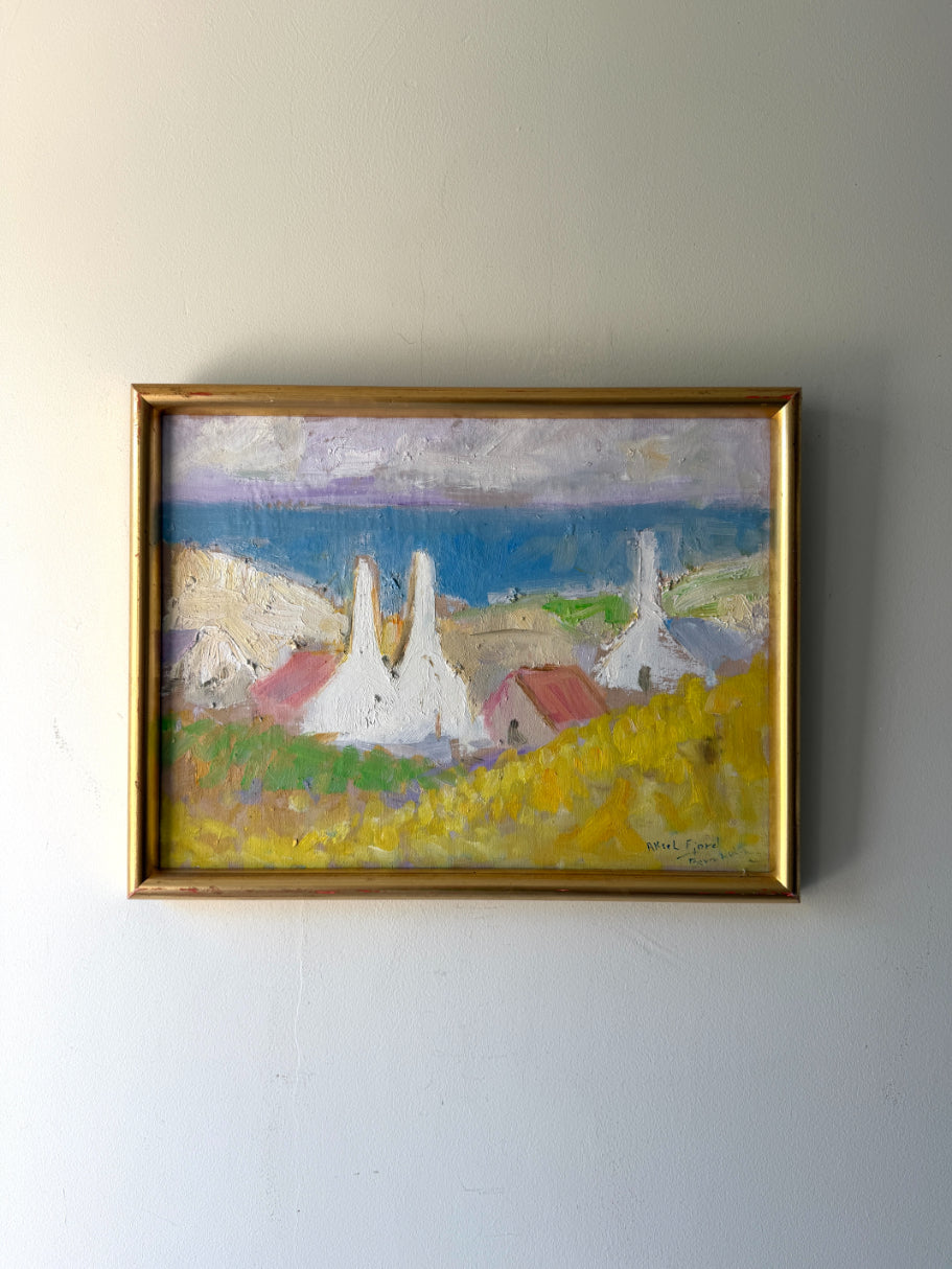 Framed vintage oil painting of a landscape with buildings. Available at Hue. 