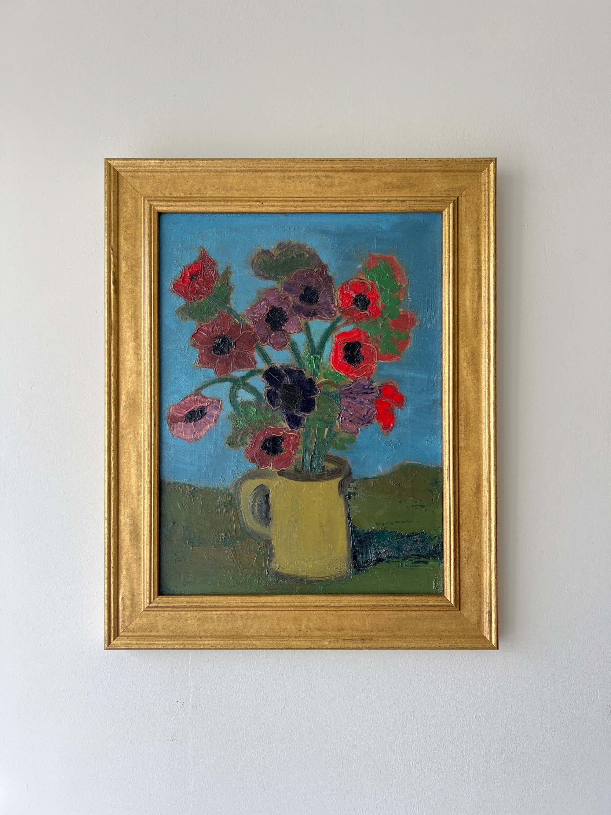 Framed, vintage artwork of red flowers on a teal blue background, available at Hue.
