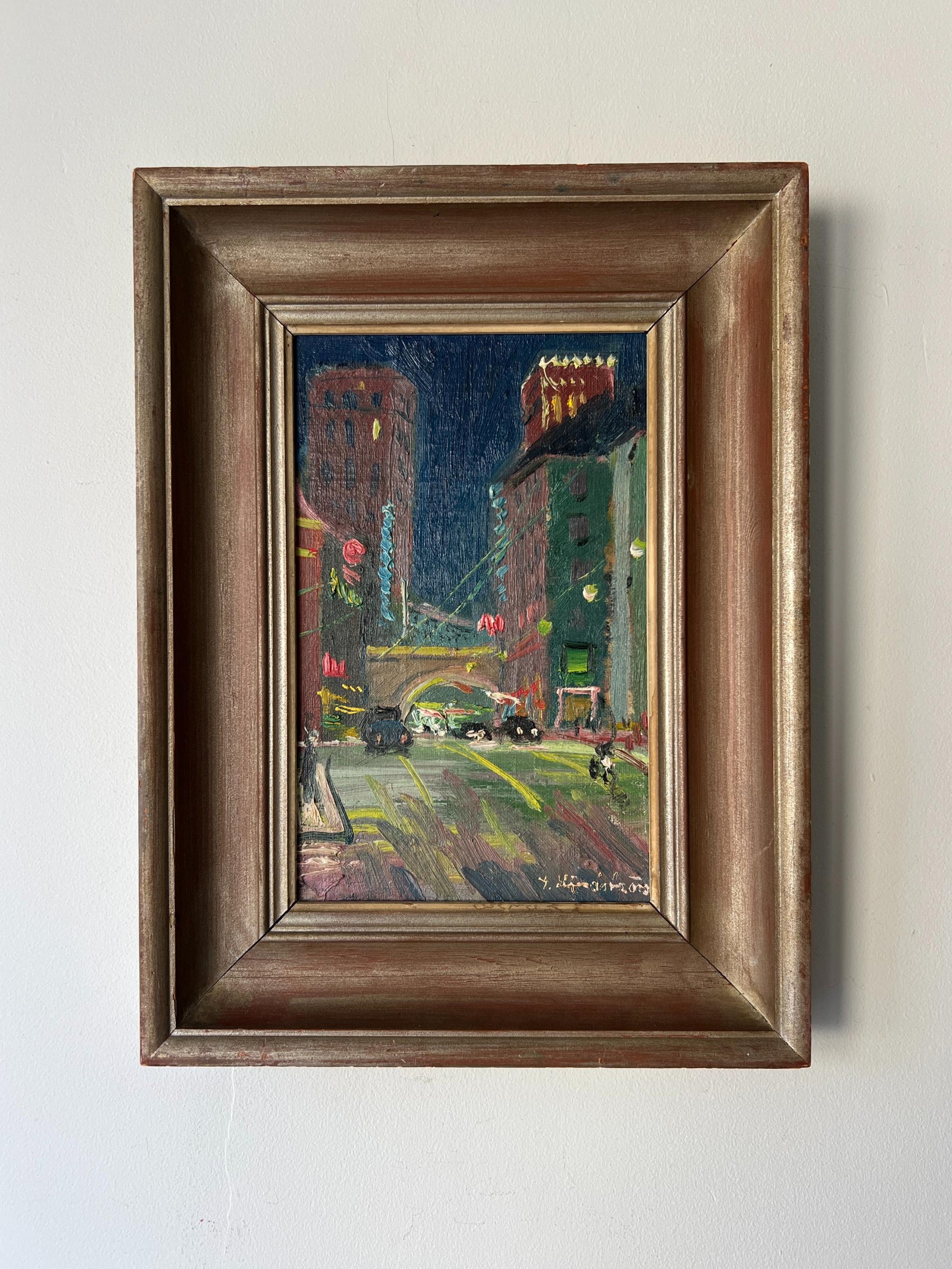 Framed vintage oil painting of a city street at night with cars and buildings. Available at Hue. 