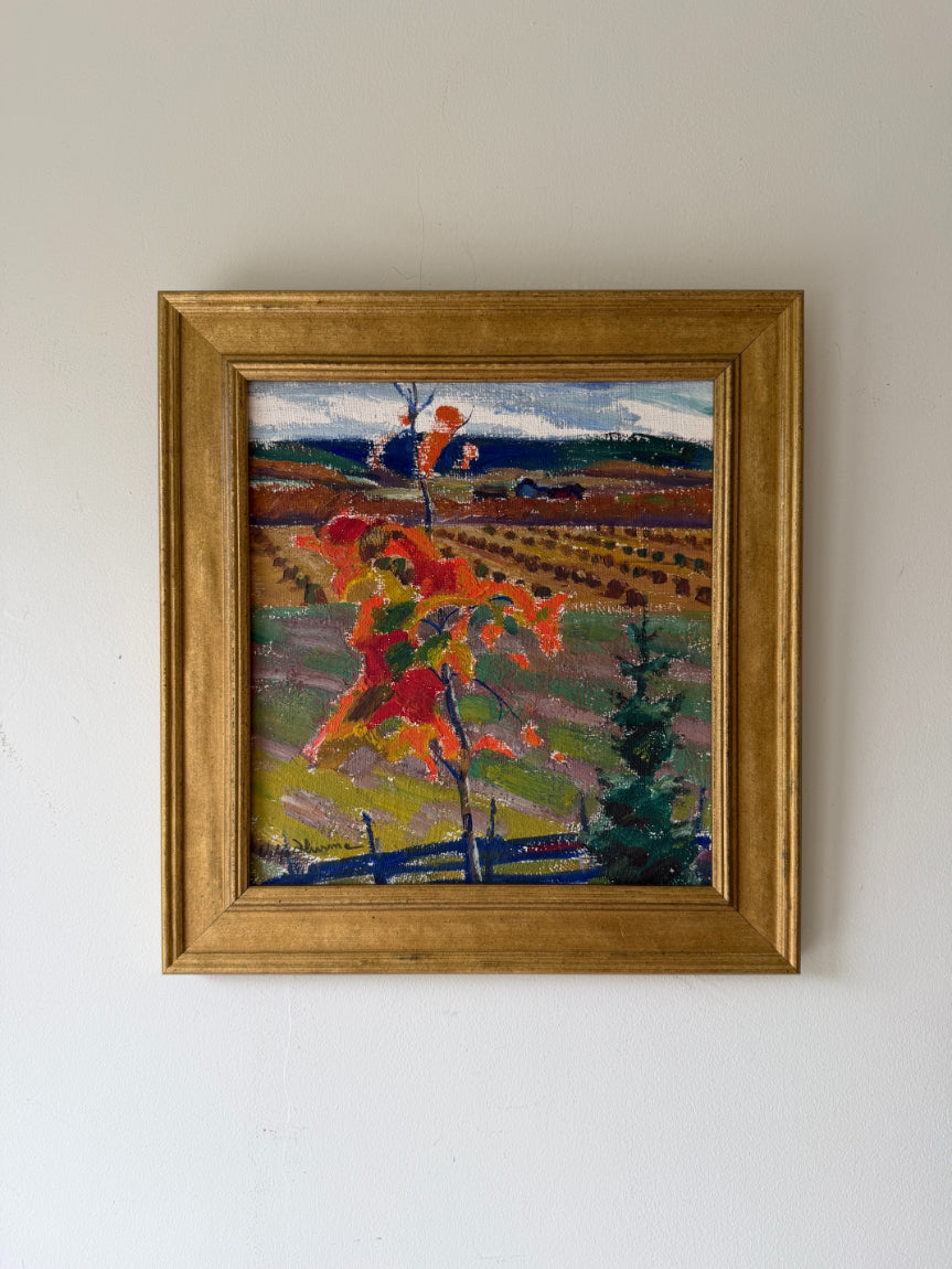 Framed vintage oil painting of a landscape with harvested fields and autumn colours. Available at Hue. 