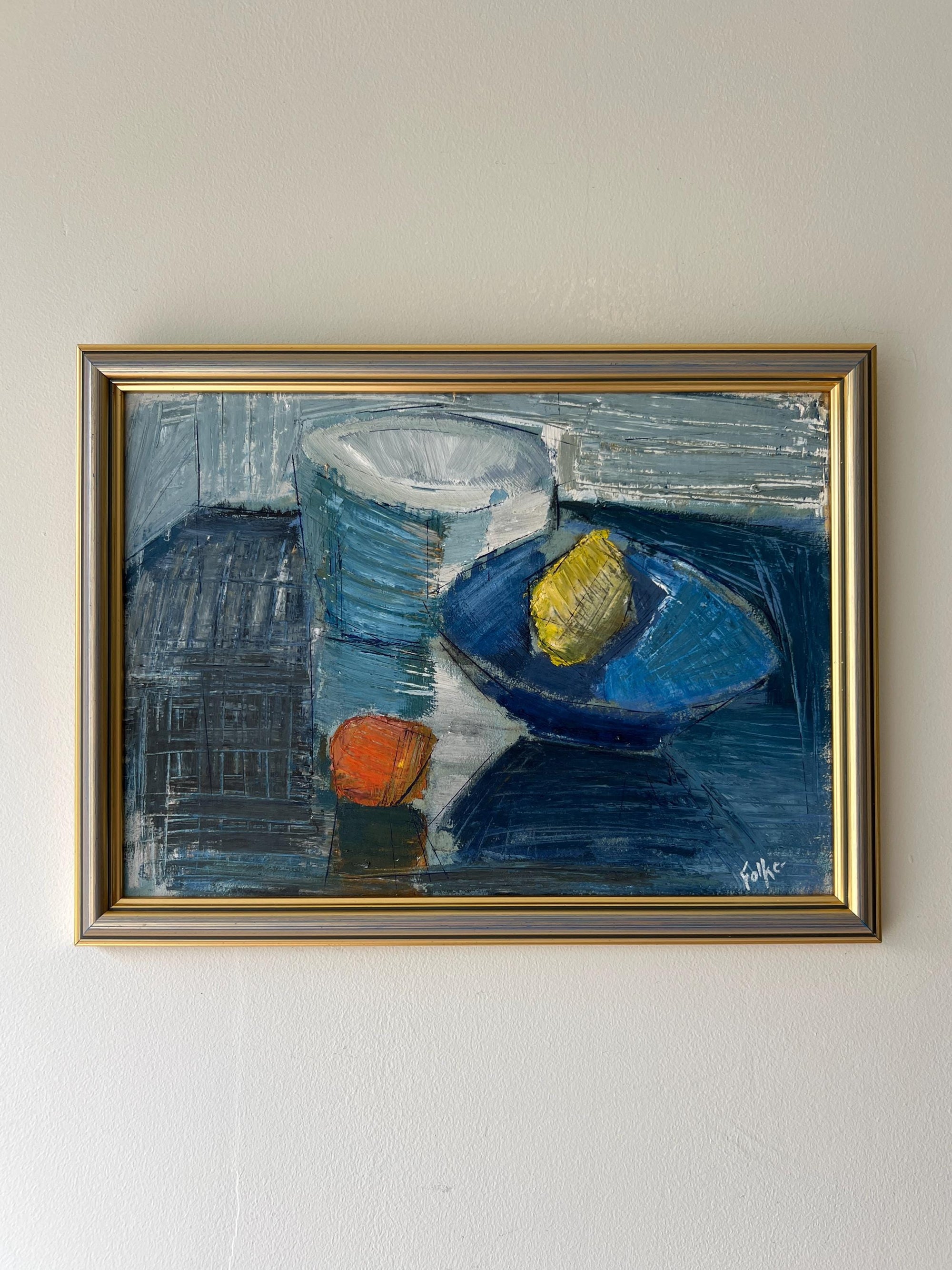 Framed vintage abstract painting of fruit and bowls on a  blue textured background, available at Hue.