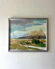 Framed landscape painting of a winter scene with fields and trees on a white wall available from hue