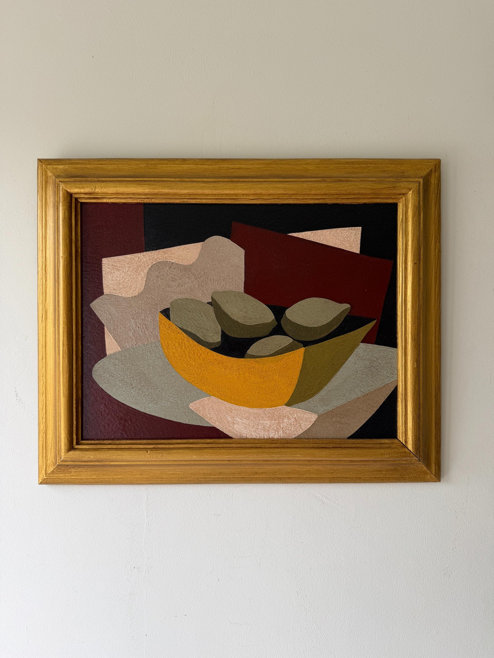 A framed abstract still life oil painting featuring a yellow bowl with fruit. Available at Hue. 