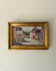 Framed vinatge oil painting of a village scene. Available at Hue. 