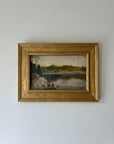 Small framed vintage oil painting of a lakeside landscape. Available at Hue. 