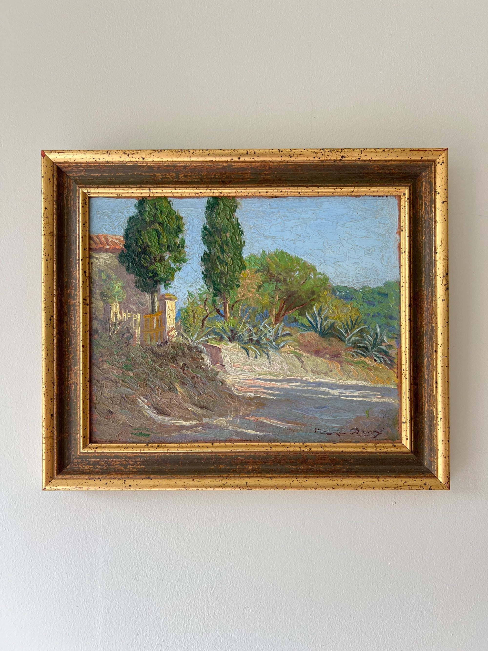 Framed vintage oil painting of a landscape with trees and a rural building, available at Hue