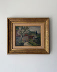 Framed vintage oil painting of a landscape with a house. Available at Hue. 