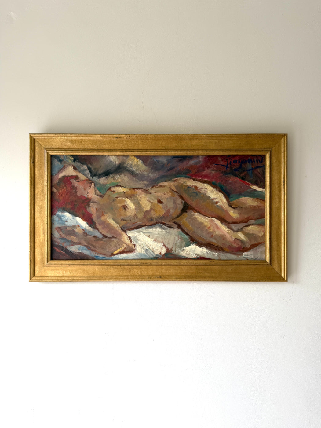 Framed vintage oil painting of a reclining nude figure. Available at Hue. 