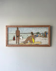 Framed artwork of a beach scene with figures, available at Hue.