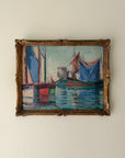 A vintage impressionist-style framed oil painting of sailboats on blue water. Available at Hue.