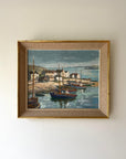 Framed vintage oil painting of a harbour scene with boats, available at Hue.