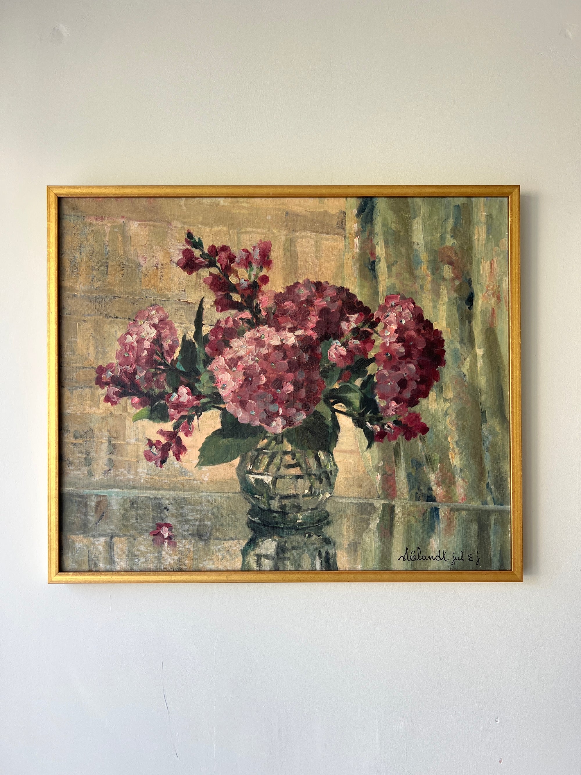 A vintage oil painting on canvas of a bouquet of dark pink hydrangeas in a glass vase, available at Hue.