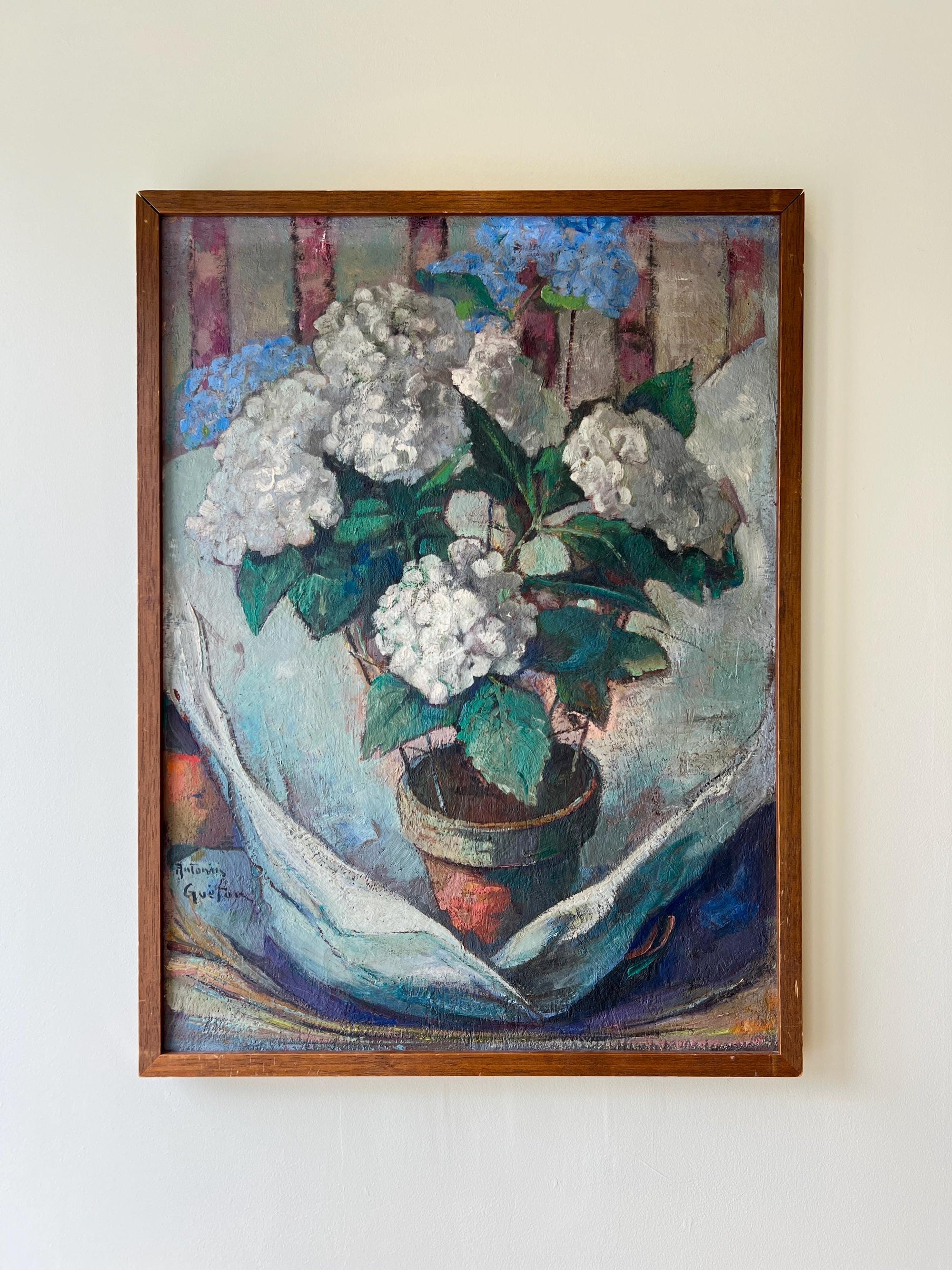 Framed vintage oil painting of a still life with blue and white hydrangea flowers in  terracotta pot, available at Hue