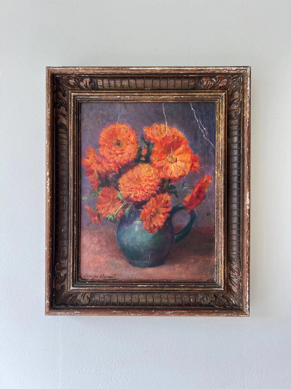 Framed painting of a bouquet of marigold flowers in a vintage frame, available from hue