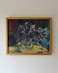 Framed vintage oil painting of a still life with flowers. Available at Hue. 