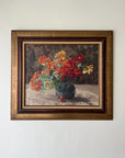 Framed vintage oil painting of a still life with flowers. Available at Hue. 