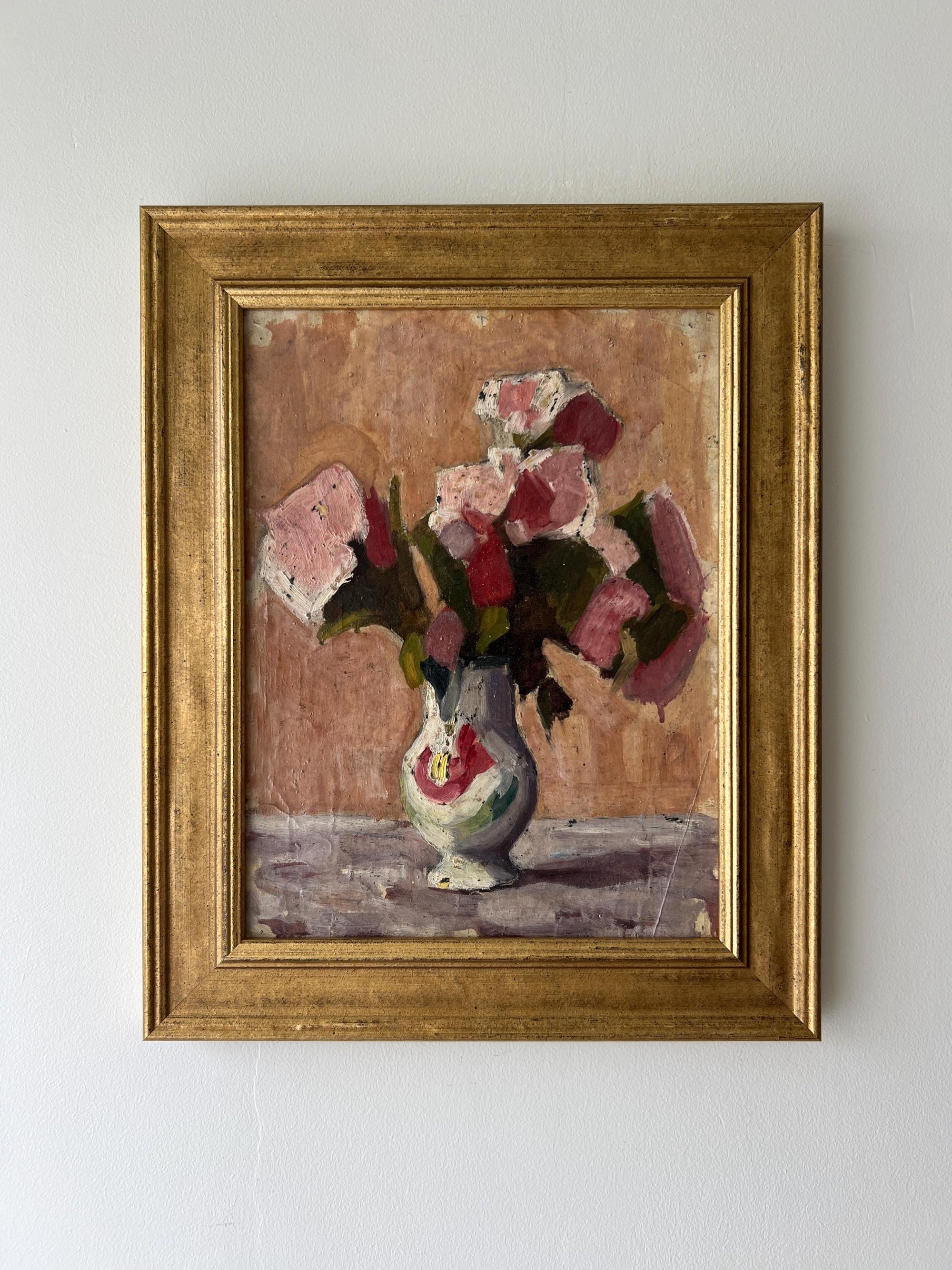 Framed vintage oil painting of a still life with pink flowers in a gilt frame, available at Hue.