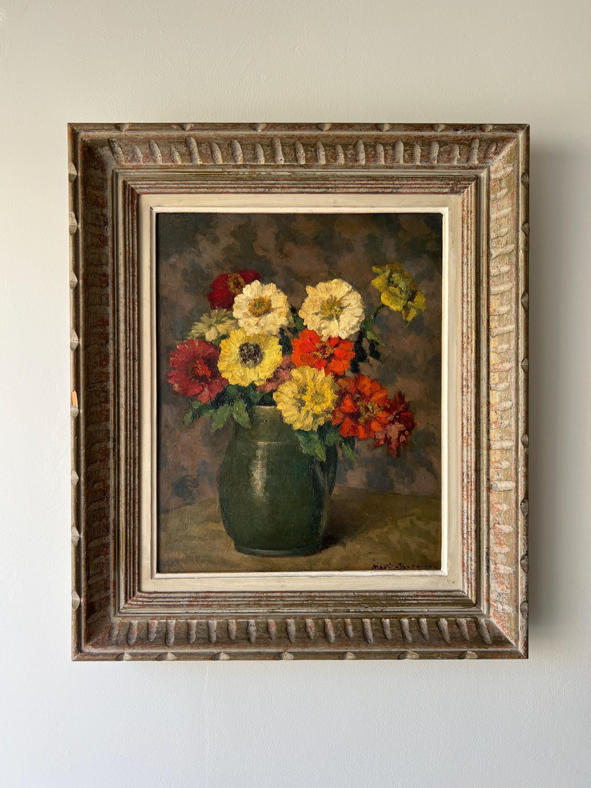 Framed vintage oil painting of a vase with colorful zinnia flowers in an ornate vintage frame, available at Hue.