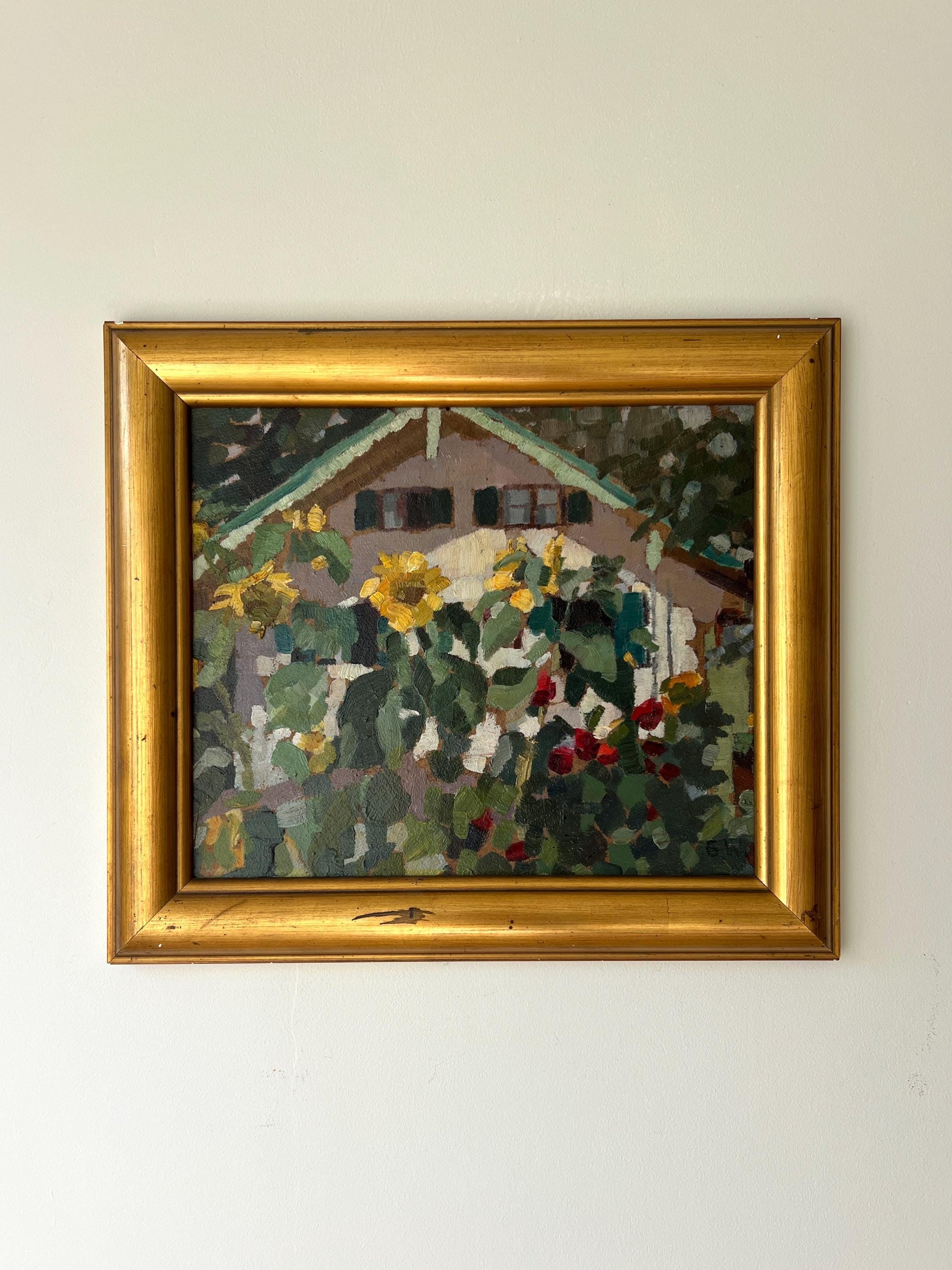 Framed vintage oil painting of a garden scene with sunflowers and a house in a  vintage gilt frame, available at Hue.