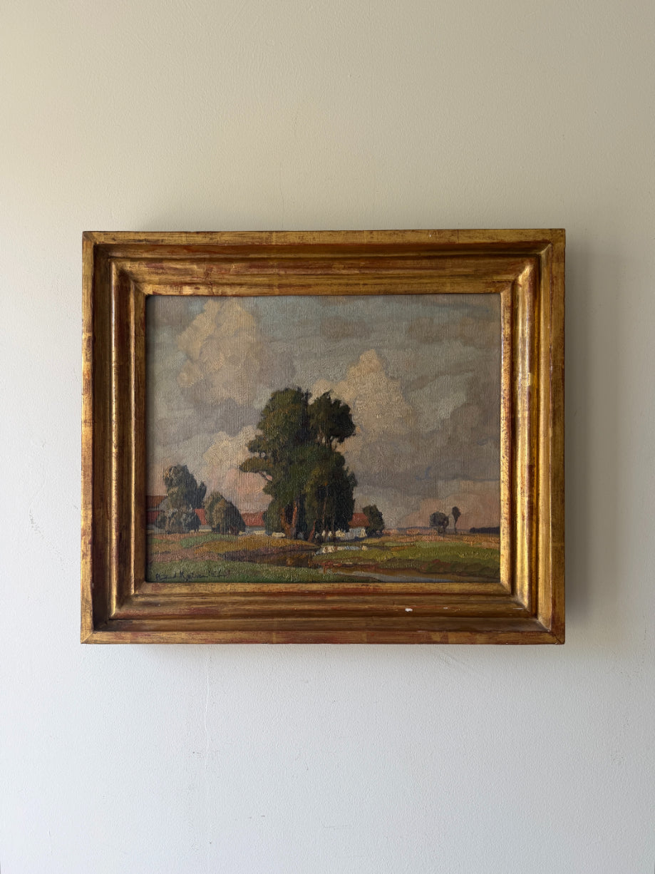 Framed vintage oil painting of a landscape with trees and fields. Available at Hue. 