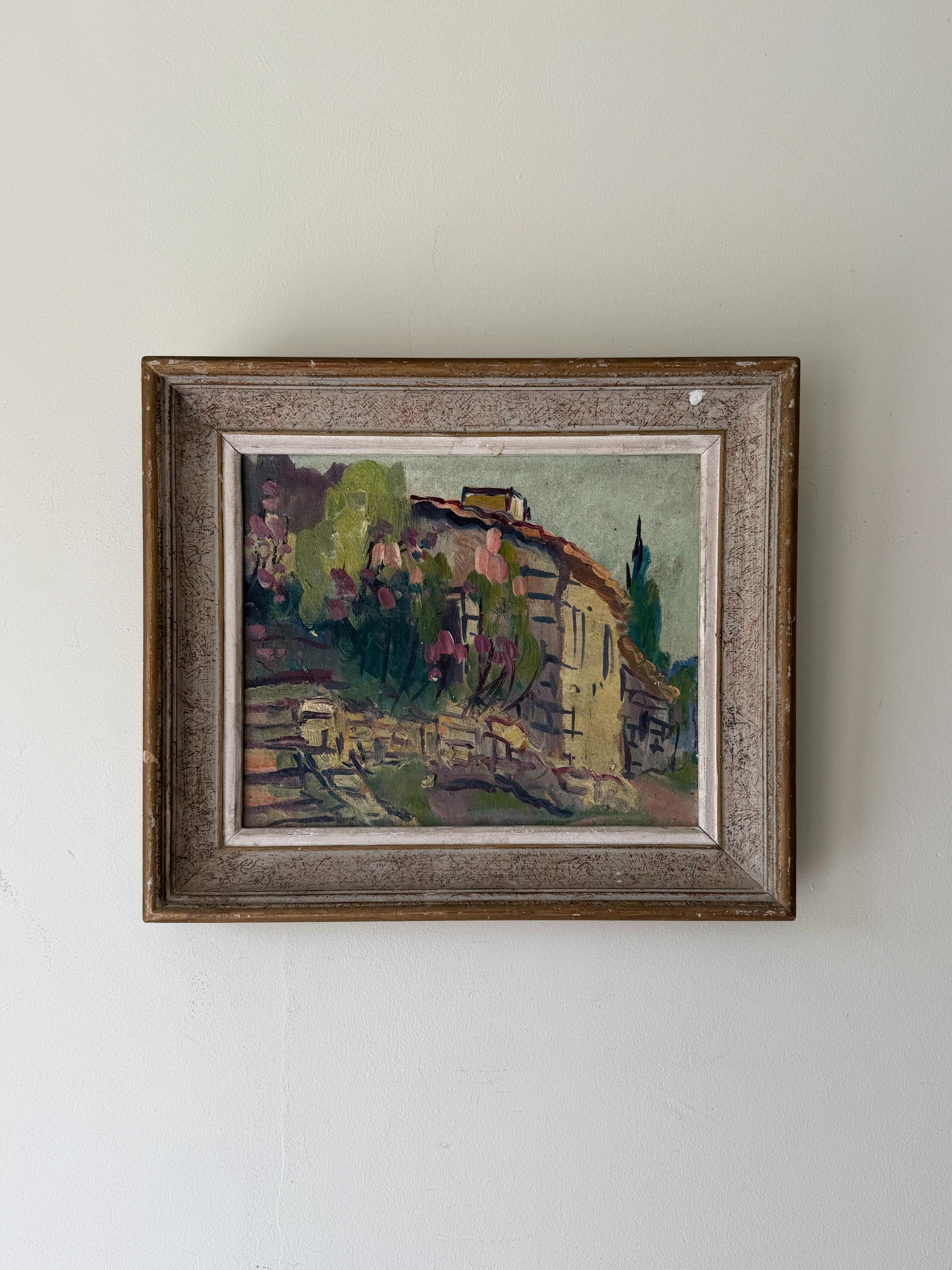 Framed vintage oil painting of a Mediterranean villa. Available at Hue. 
