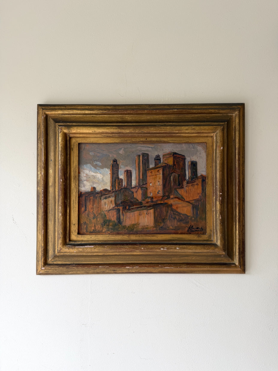 Framed vinatge oil painting of Italian town houses at sunset. Available at Hue.