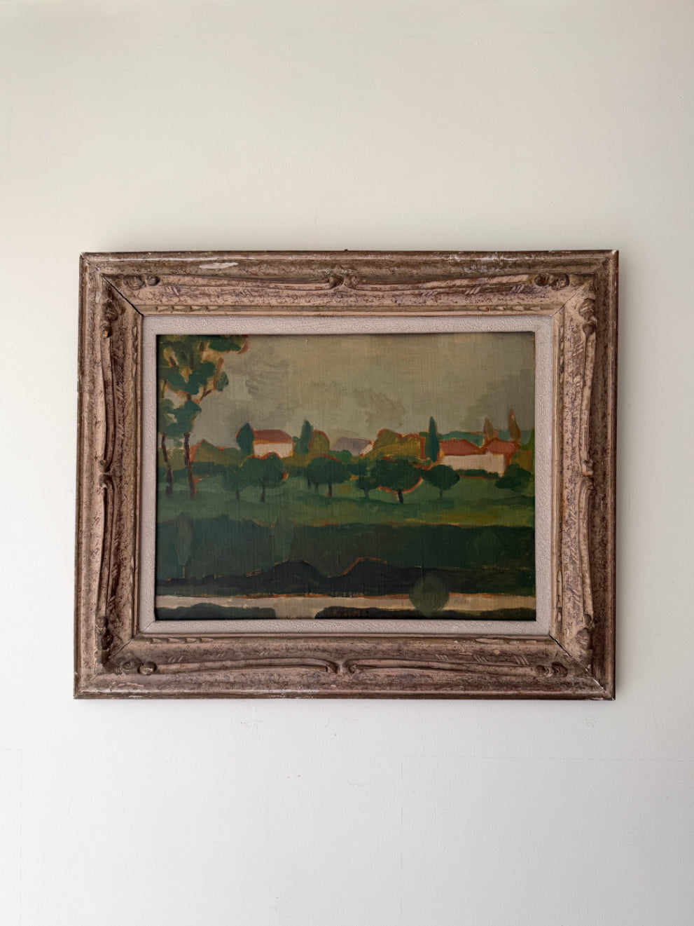 Framed vintage oil painting of am Italian landscape with trees and buildings. Available at Hue. 