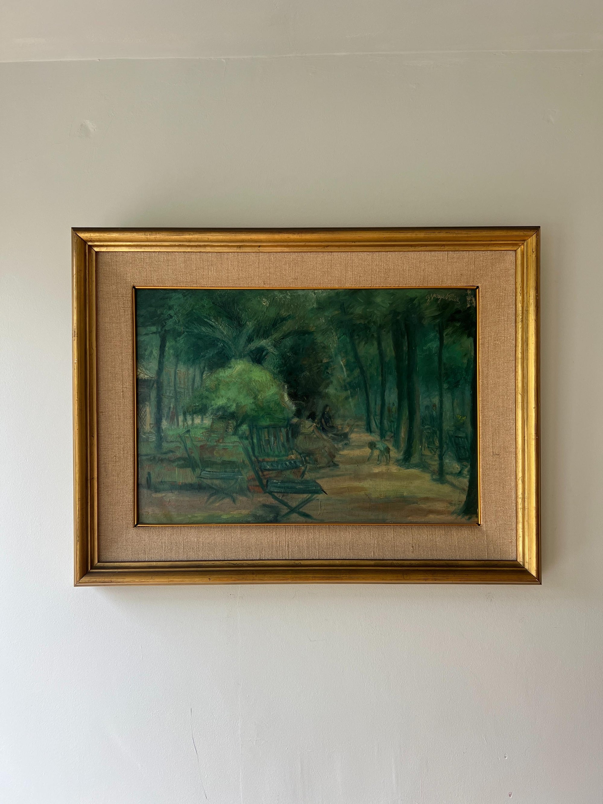 Framed vintage oil painting of a park scene, available at Hue.