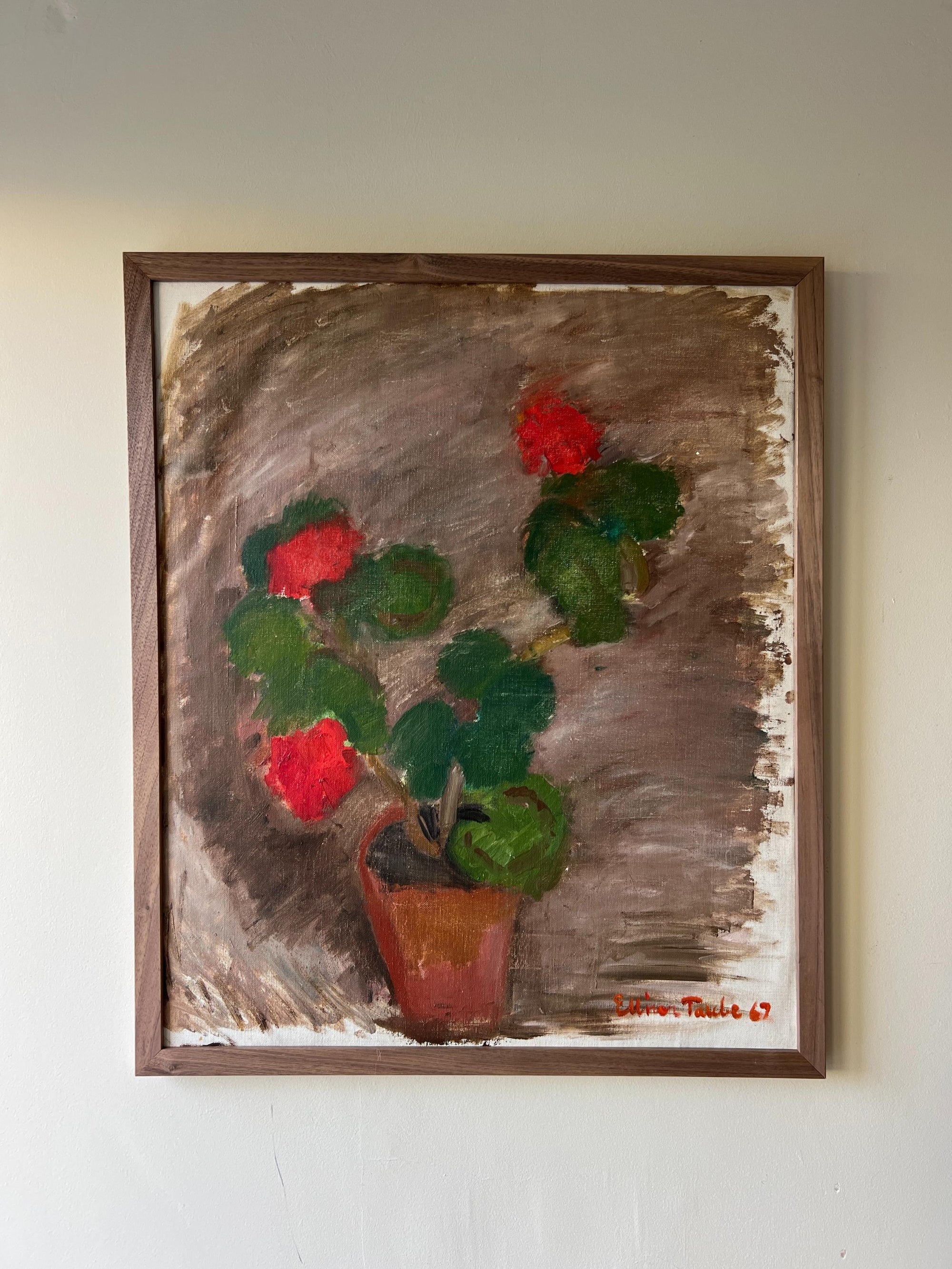 Framed vintage oil painting of a red geranium in a solid walnut frame, available at Hue.