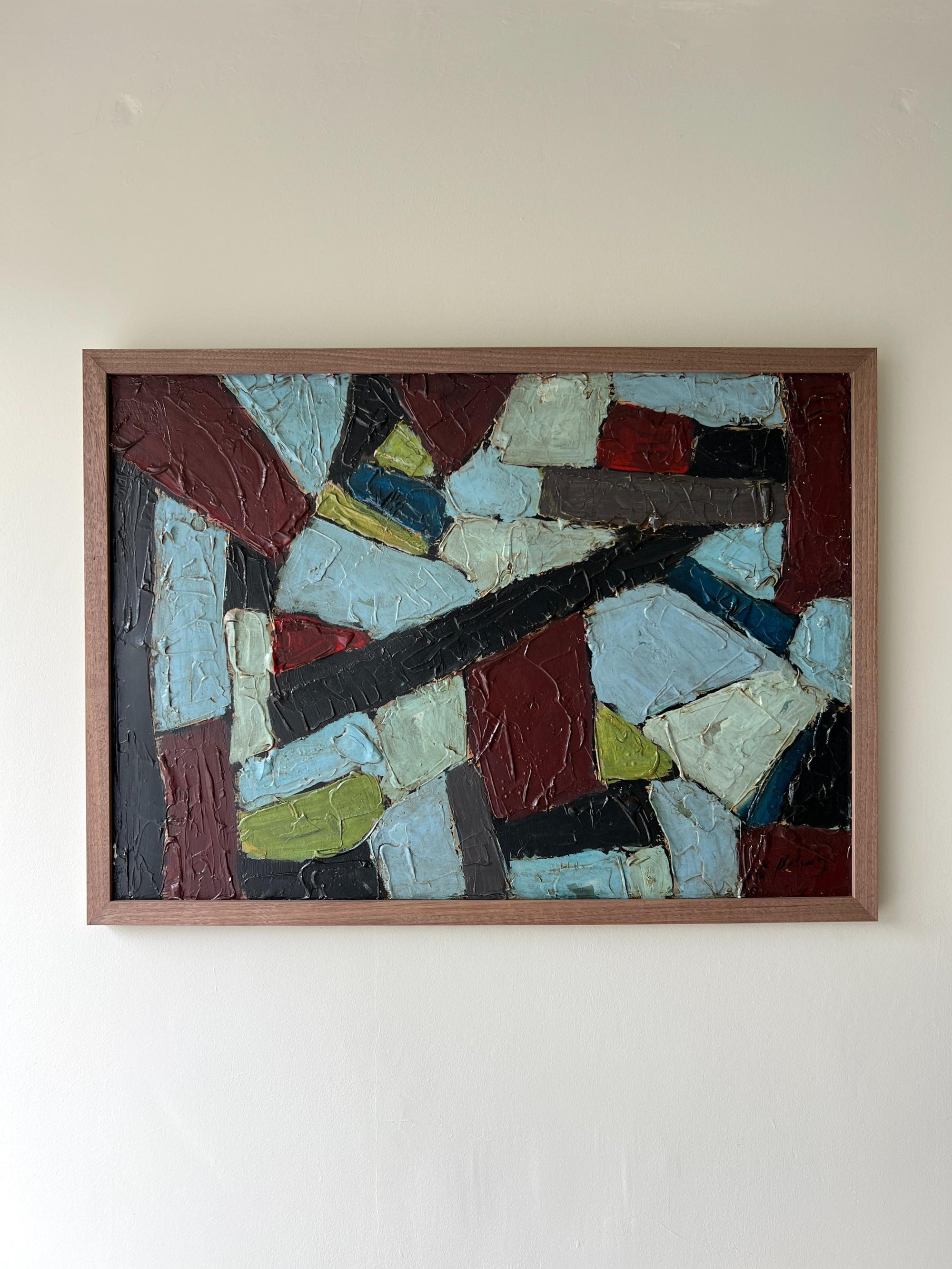 Framed vintage oil abstract artwork with multicolored geometric shapes in a solid walnut frame, available at Hue.