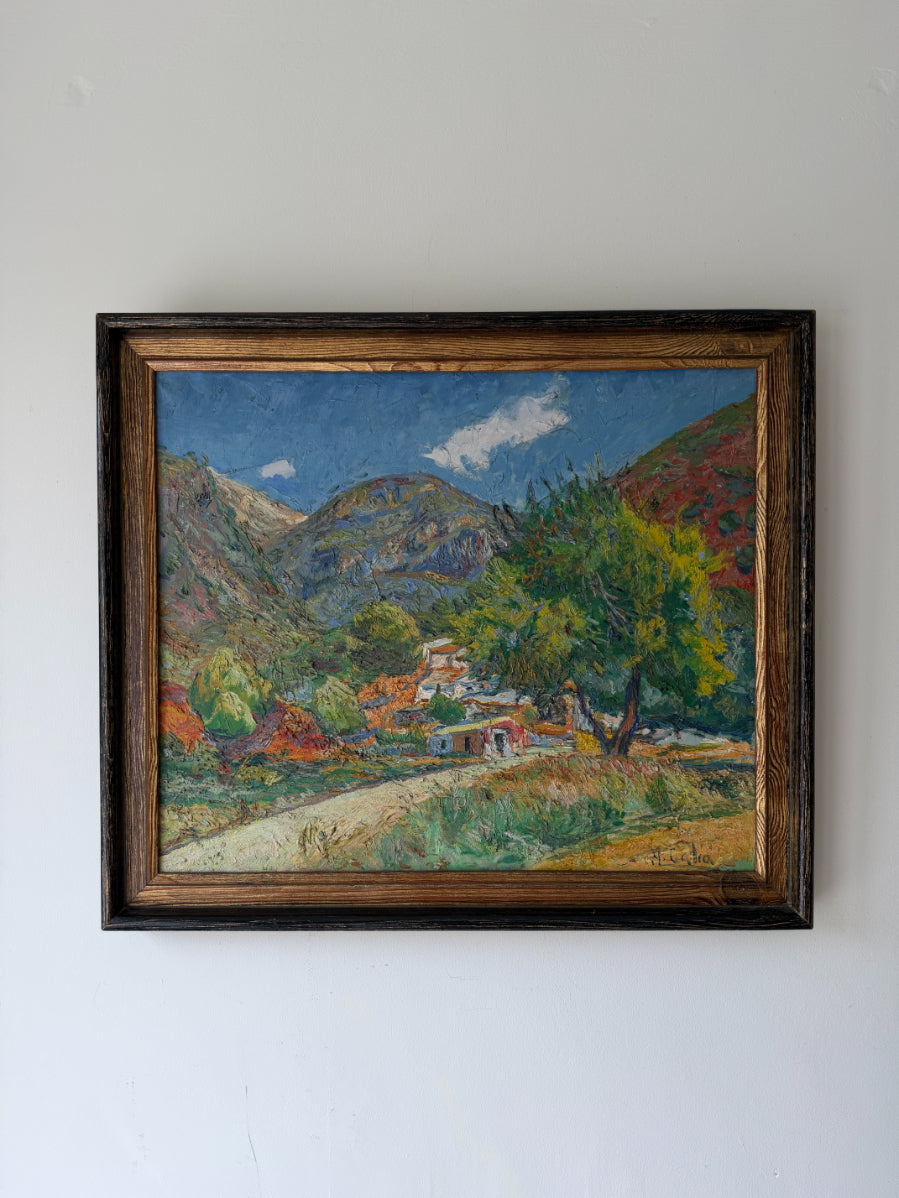 Framed vinatge oil painting of a mountainous landscape with houses. Available at Hue. 