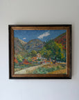 Framed vinatge oil painting of a mountainous landscape with houses. Available at Hue. 