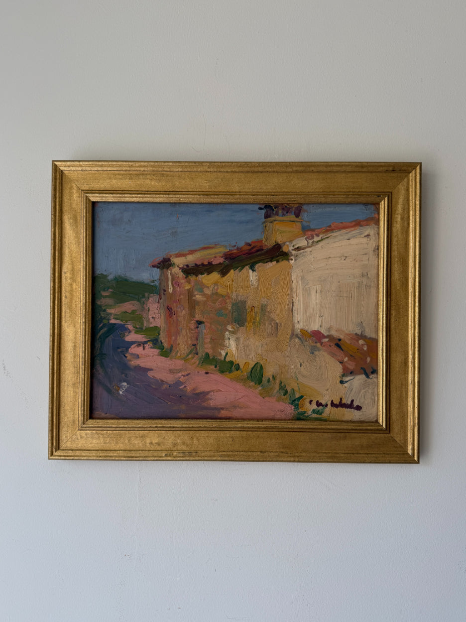 Framed vintage oil painting of Spanish village houses in the sun. Available at Hue. 