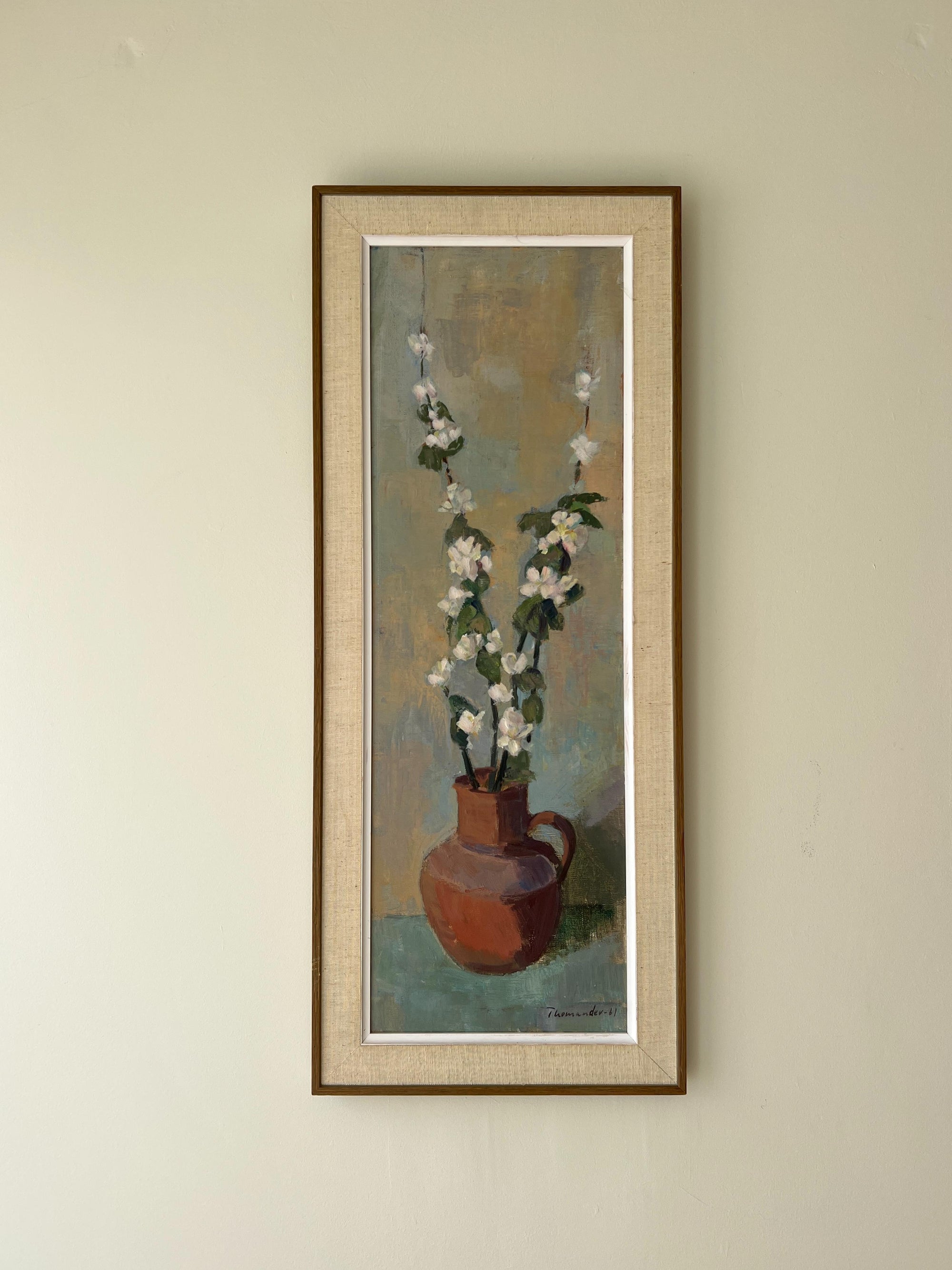 Framed vintage oil painting of a vase with apple blossom flowers in a vintage frame, available at Hue.