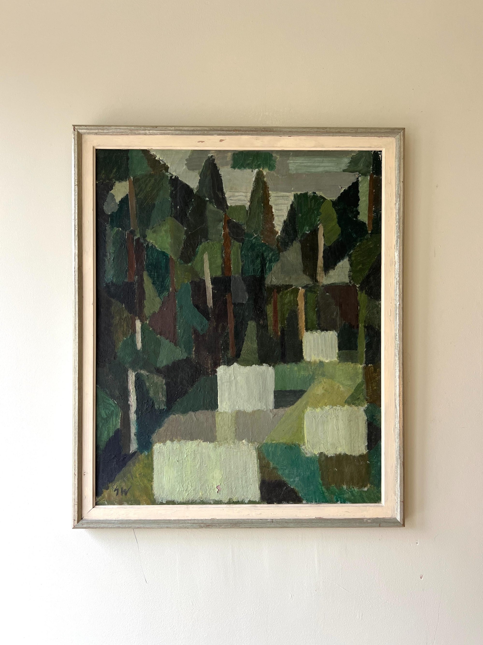 A framed vintage oil painting of an abstract forest scene. Available at Hue. 